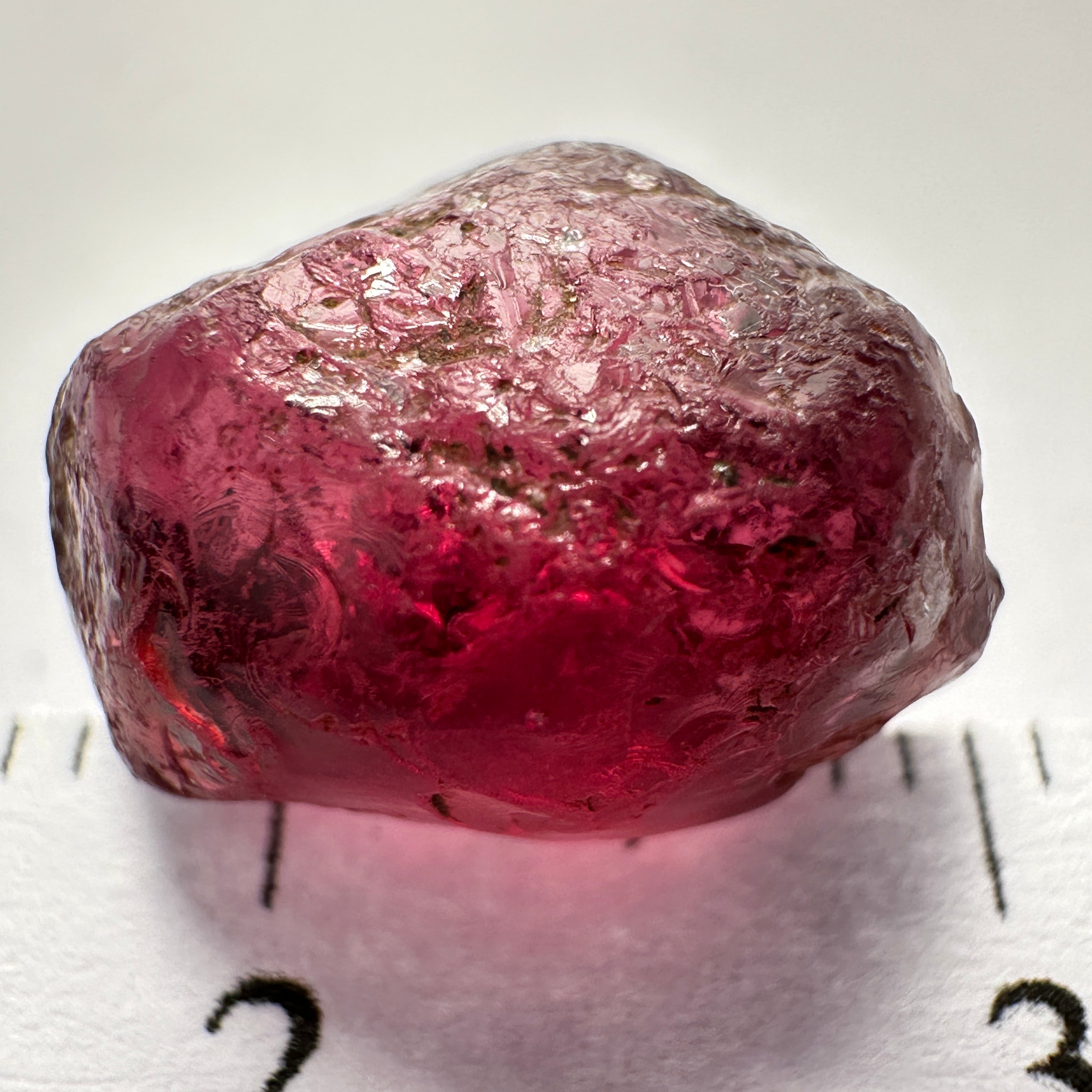 Rhodolite Garnet Colour Shifting, 8.46ct, Umba, Tanzania, Untreated Untreated. Slight skin issue (2mm on one side) will come off on faceting, rest vvs-if