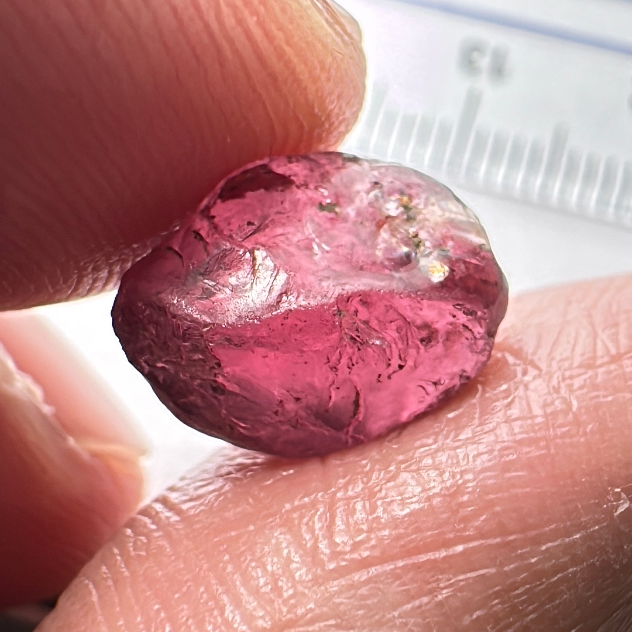 Rhodolite Garnet Colour Shifting, 8.46ct, Umba, Tanzania, Untreated Untreated. Slight skin issue (2mm on one side) will come off on faceting, rest vvs-if