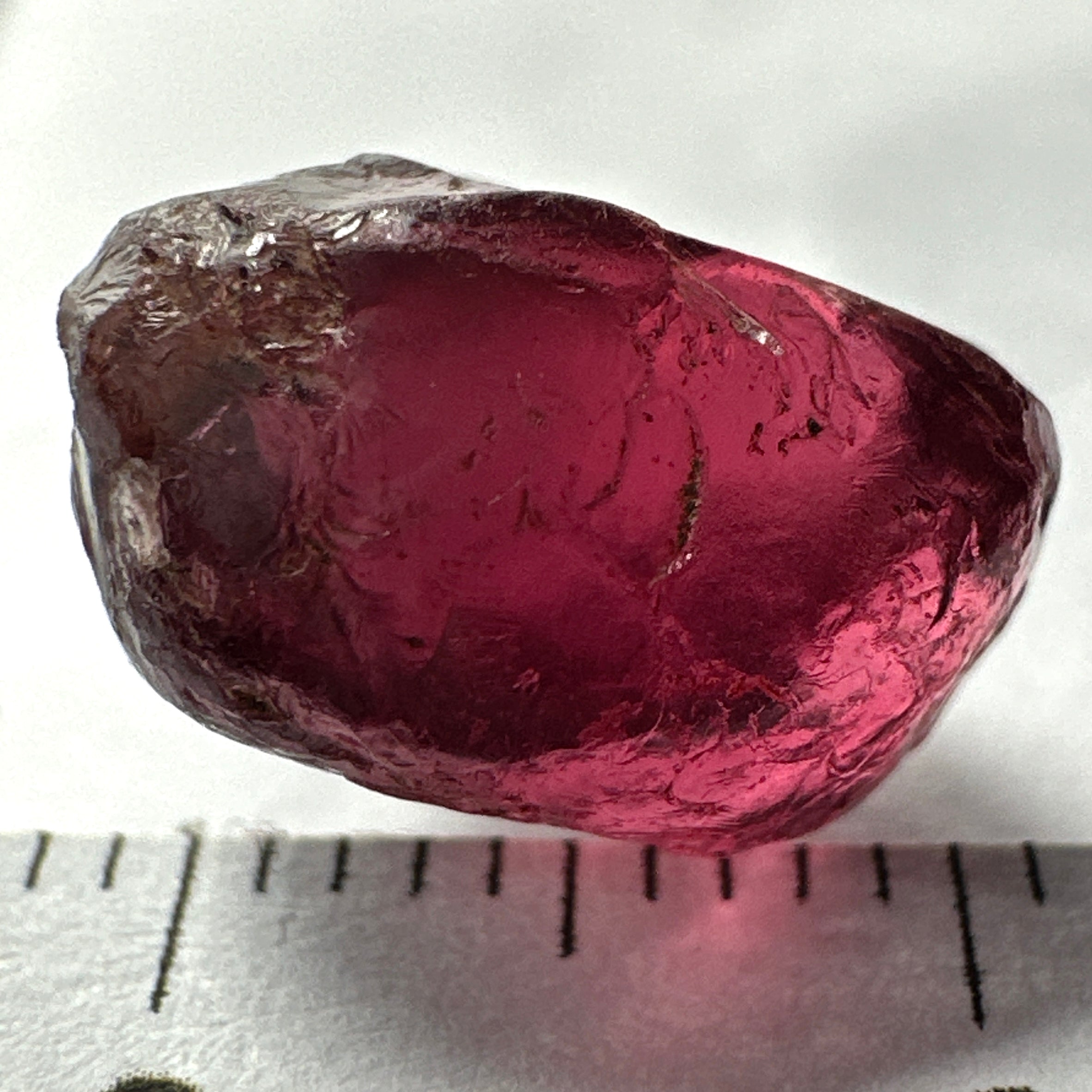 Rhodolite Garnet Colour Shifting, 8.46ct, Umba, Tanzania, Untreated Untreated. Slight skin issue (2mm on one side) will come off on faceting, rest vvs-if