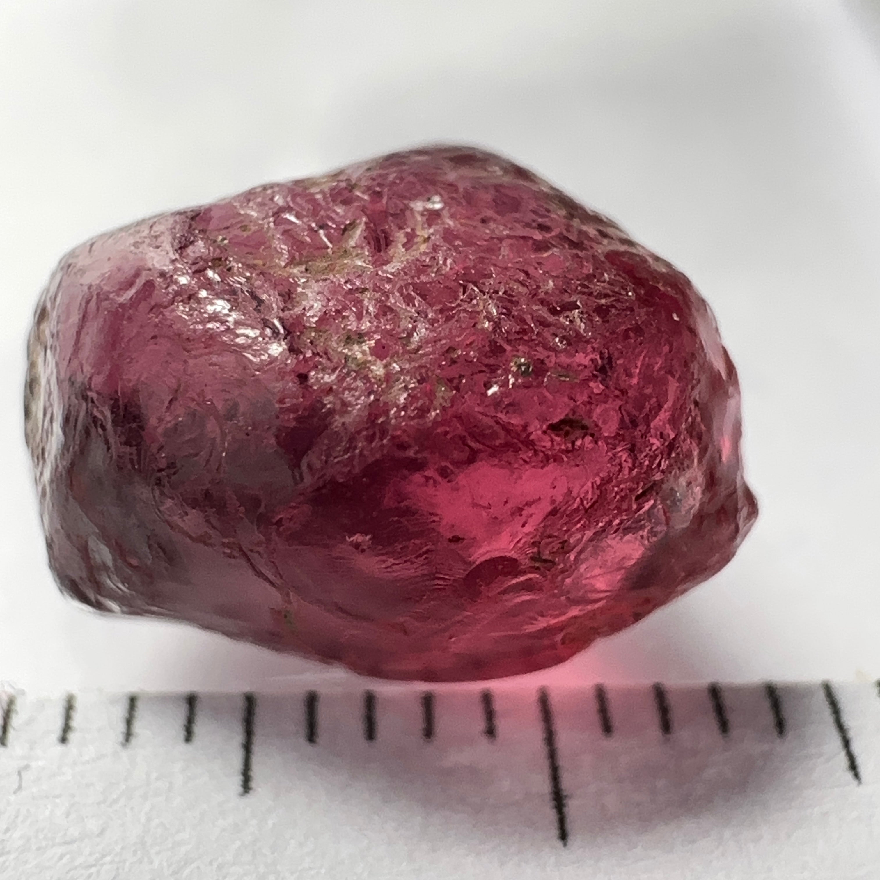 Rhodolite Garnet Colour Shifting, 8.46ct, Umba, Tanzania, Untreated Untreated. Slight skin issue (2mm on one side) will come off on faceting, rest vvs-if