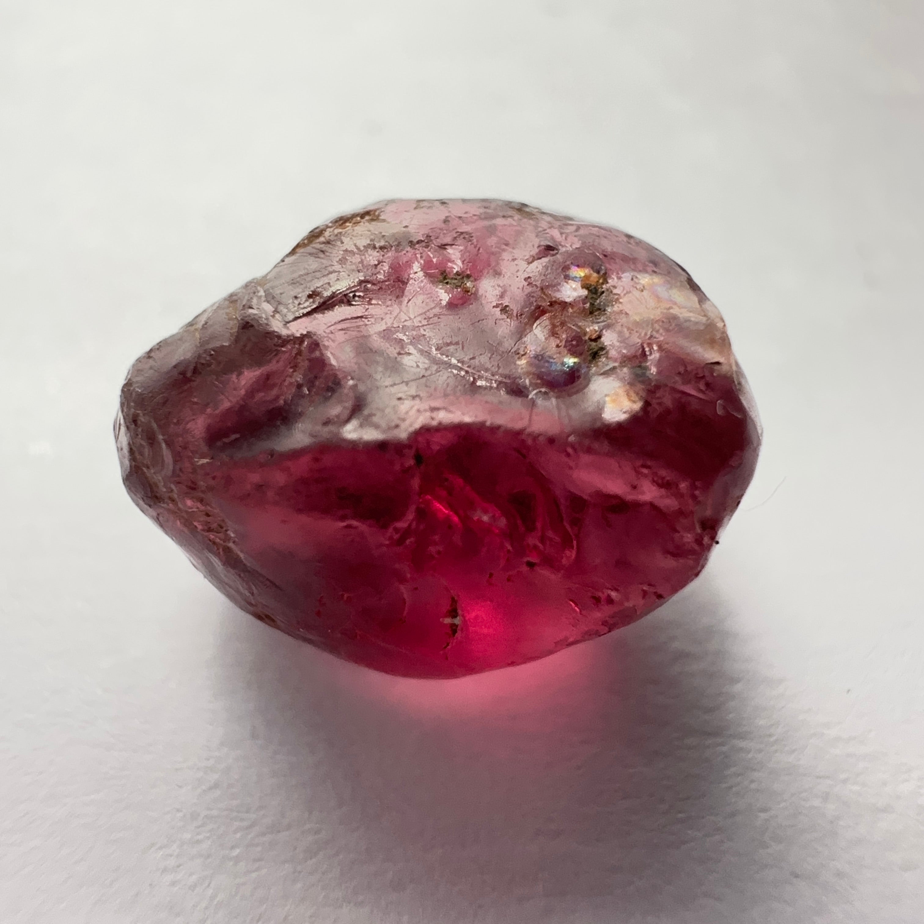 Rhodolite Garnet Colour Shifting, 8.46ct, Umba, Tanzania, Untreated Untreated. Slight skin issue (2mm on one side) will come off on faceting, rest vvs-if