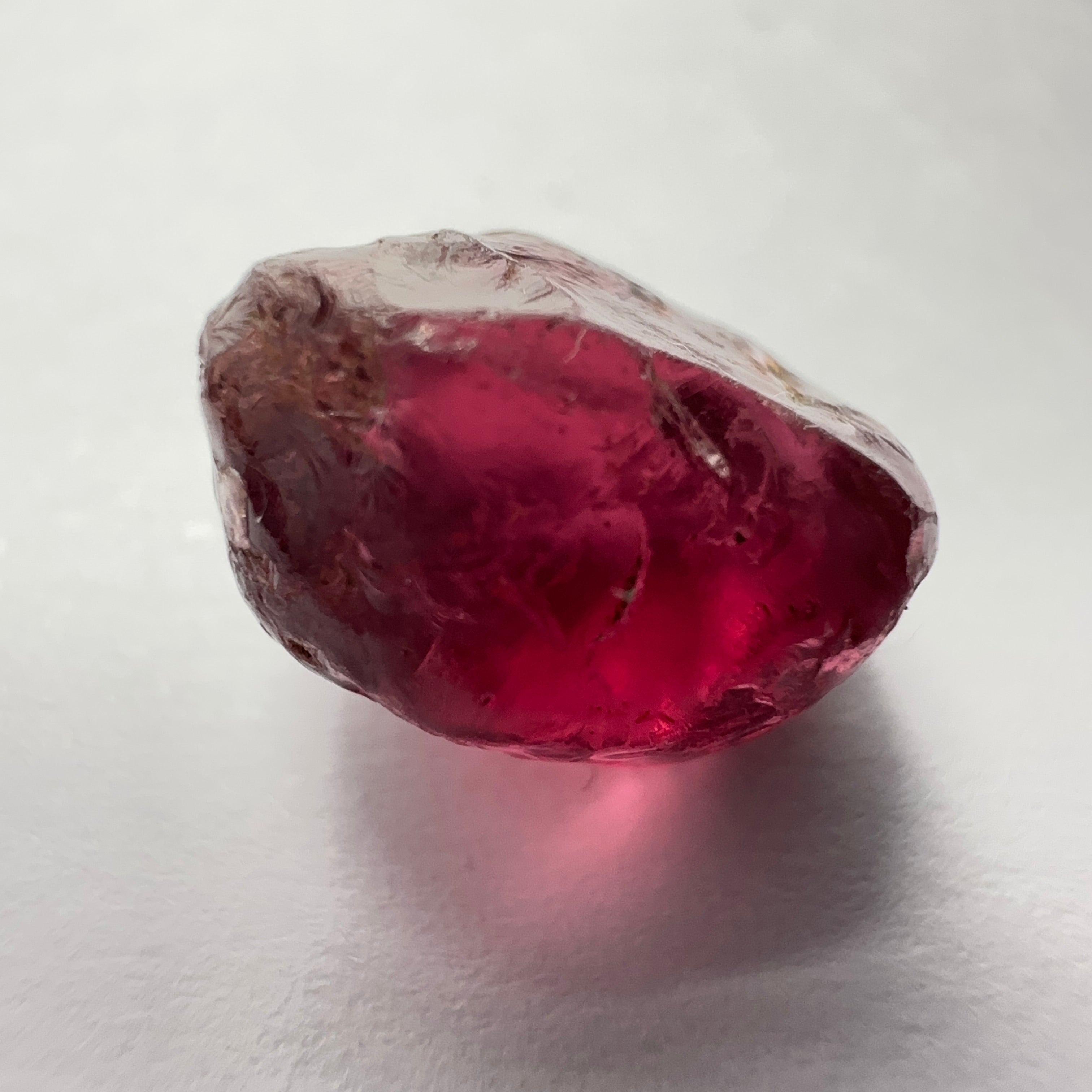 Rhodolite Garnet Colour Shifting, 8.46ct, Umba, Tanzania, Untreated Untreated. Slight skin issue (2mm on one side) will come off on faceting, rest vvs-if