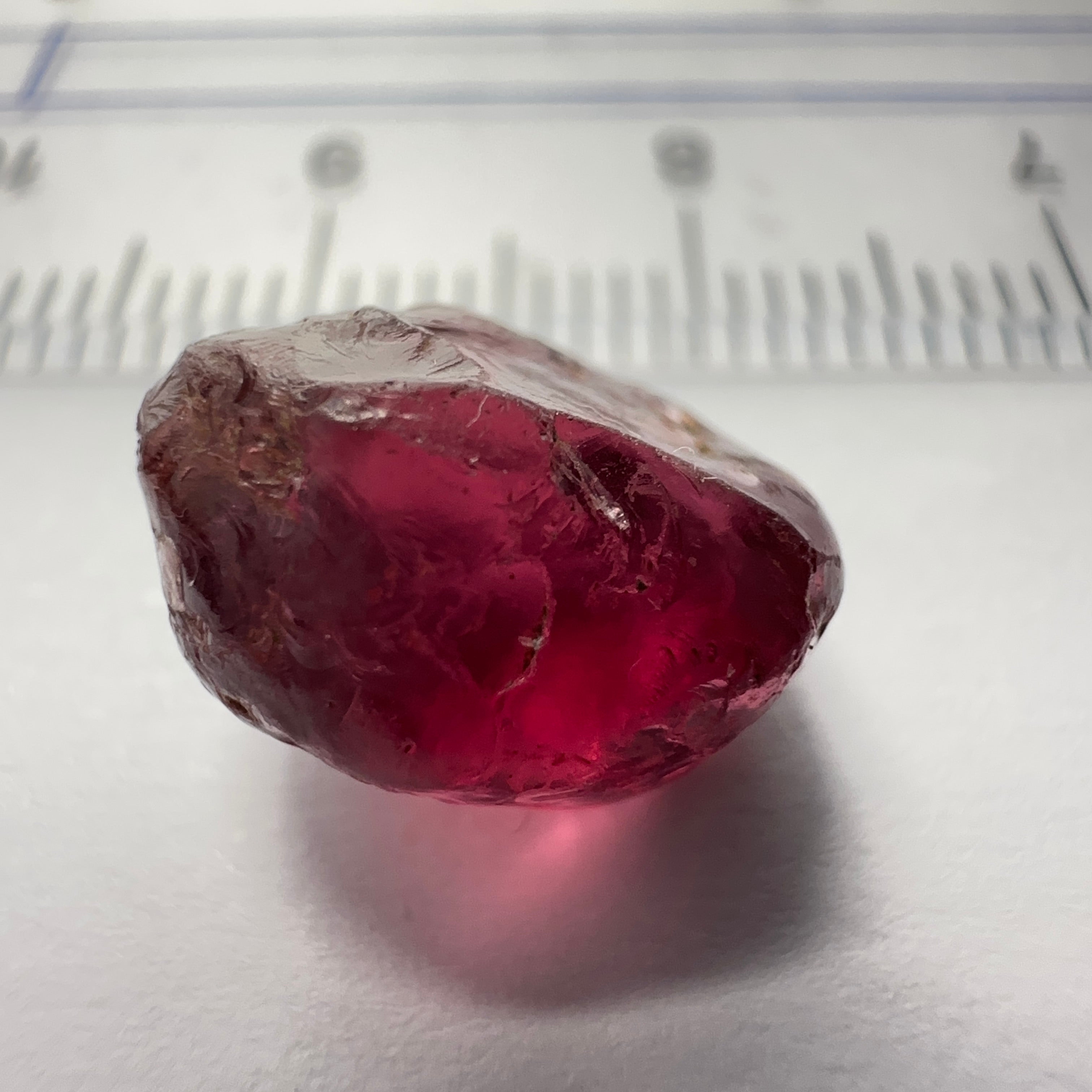 Rhodolite Garnet Colour Shifting, 8.46ct, Umba, Tanzania, Untreated Untreated. Slight skin issue (2mm on one side) will come off on faceting, rest vvs-if