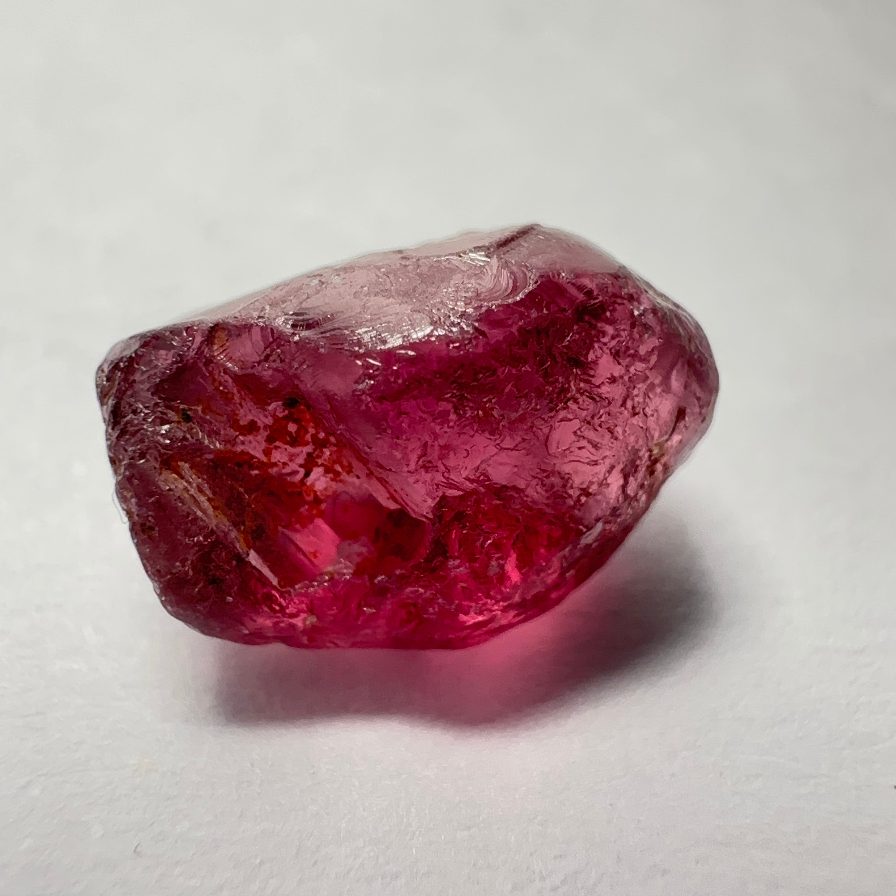 Rhodolite Garnet Colour Shifting, 4.75ct, Umba, Tanzania, Untreated Untreated. Few bubbles right on the outside 1mm into the skin, rest vvs, also note the weird skin indentation, see pics