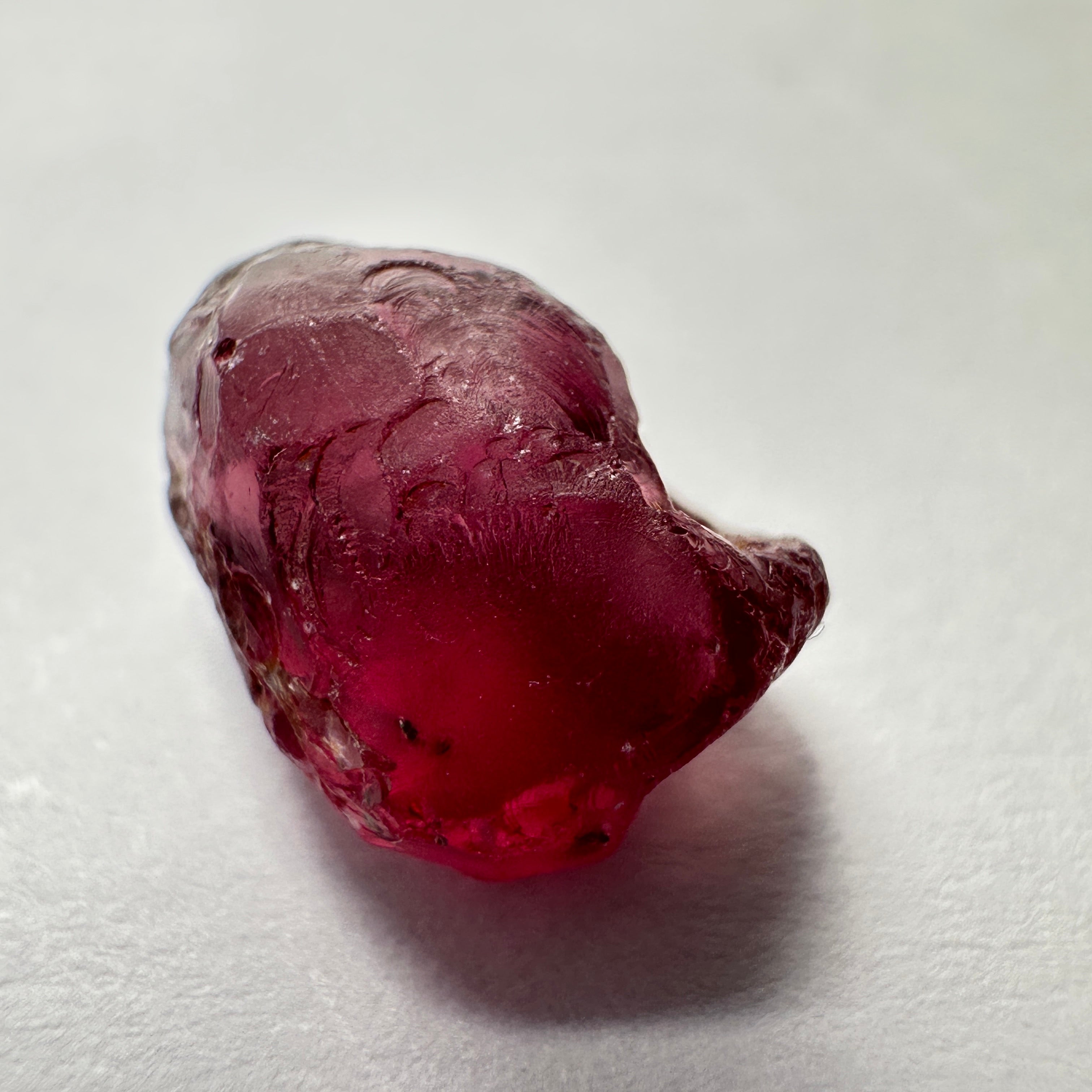 Rhodolite Garnet Colour Shifting, 4.75ct, Umba, Tanzania, Untreated Untreated. Few bubbles right on the outside 1mm into the skin, rest vvs, also note the weird skin indentation, see pics