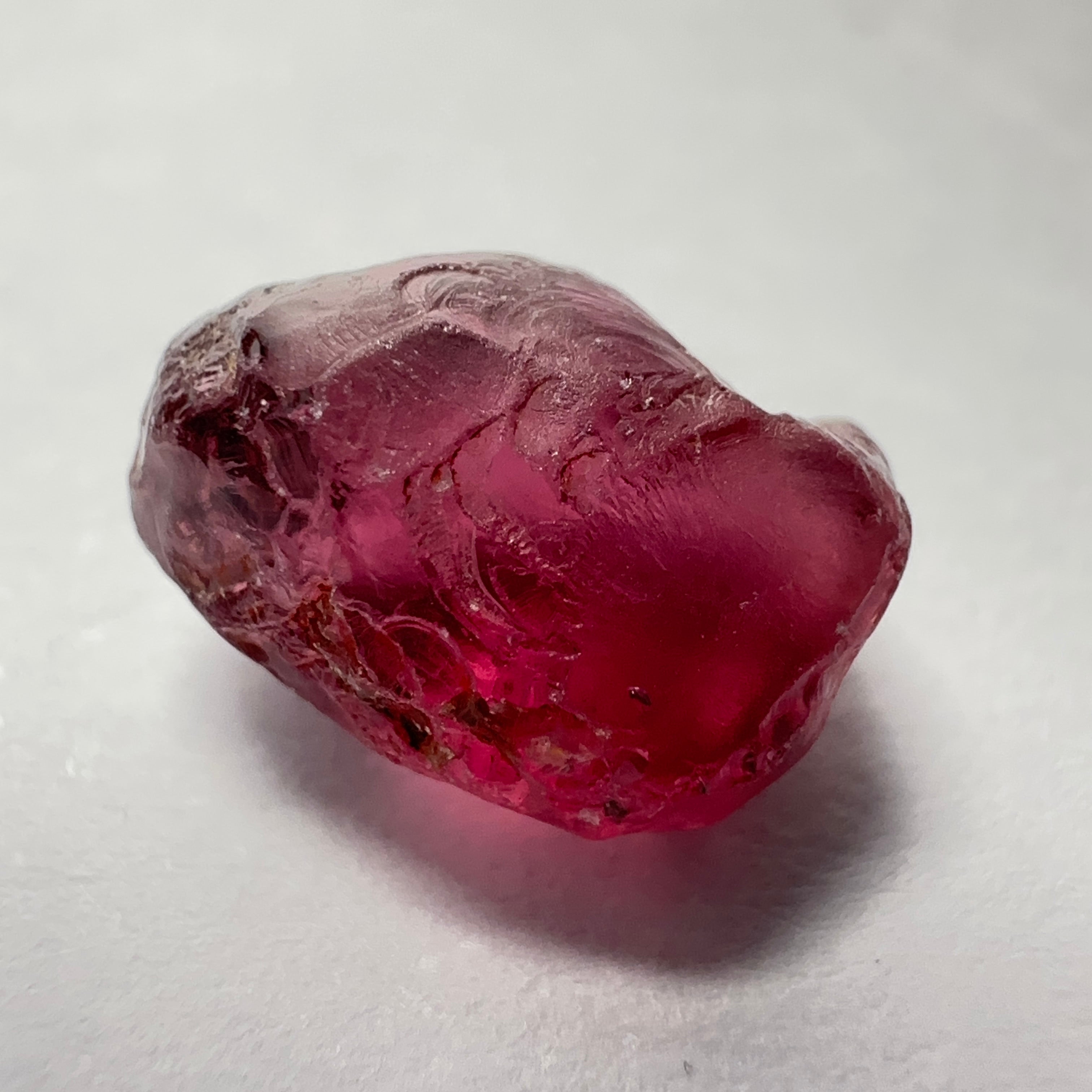 Rhodolite Garnet Colour Shifting, 4.75ct, Umba, Tanzania, Untreated Untreated. Few bubbles right on the outside 1mm into the skin, rest vvs, also note the weird skin indentation, see pics