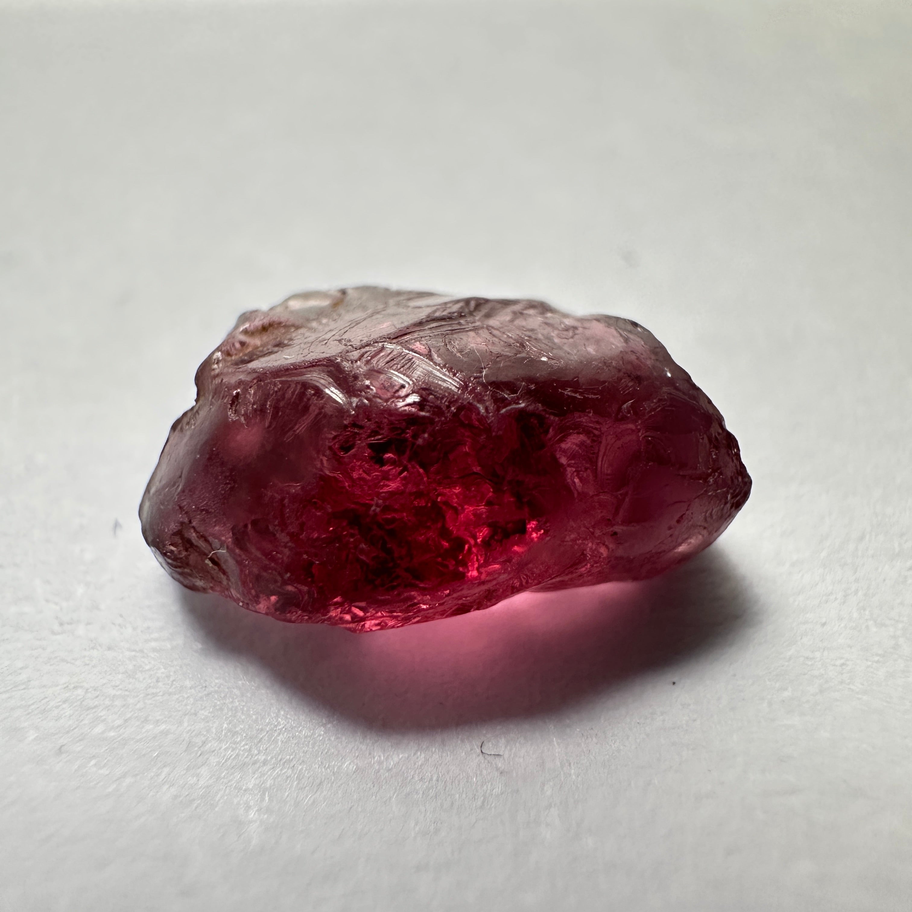 Rhodolite Garnet Colour Shifting, 5.74ct, Umba, Tanzania, Untreated Untreated. Slight issues on the outside, will come off on faceting, rest vvs