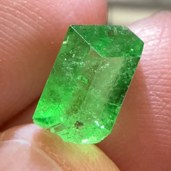 Tsavorite Garnet Crystal, 3.65ct A very unusual Tsavorite crystal from Merelani in Tanzania, Untreated Unheated, see the photos taken in different lights