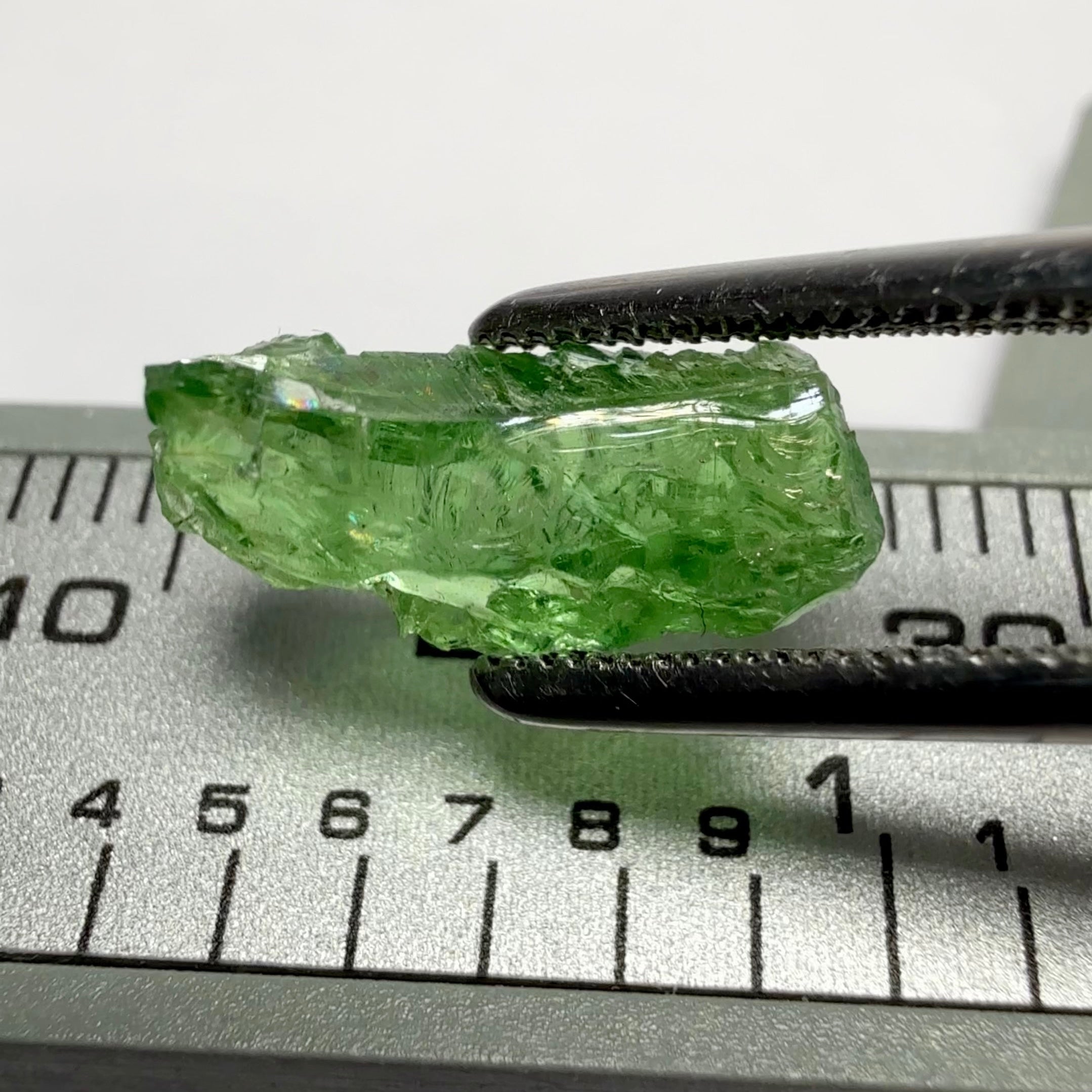 Tsavorite Garnet, Tanzania, 3.16ct, Untreated Unheated, some cracks on the outside skin, inside VS-Si challenging shape, maybe cut a baguette shape