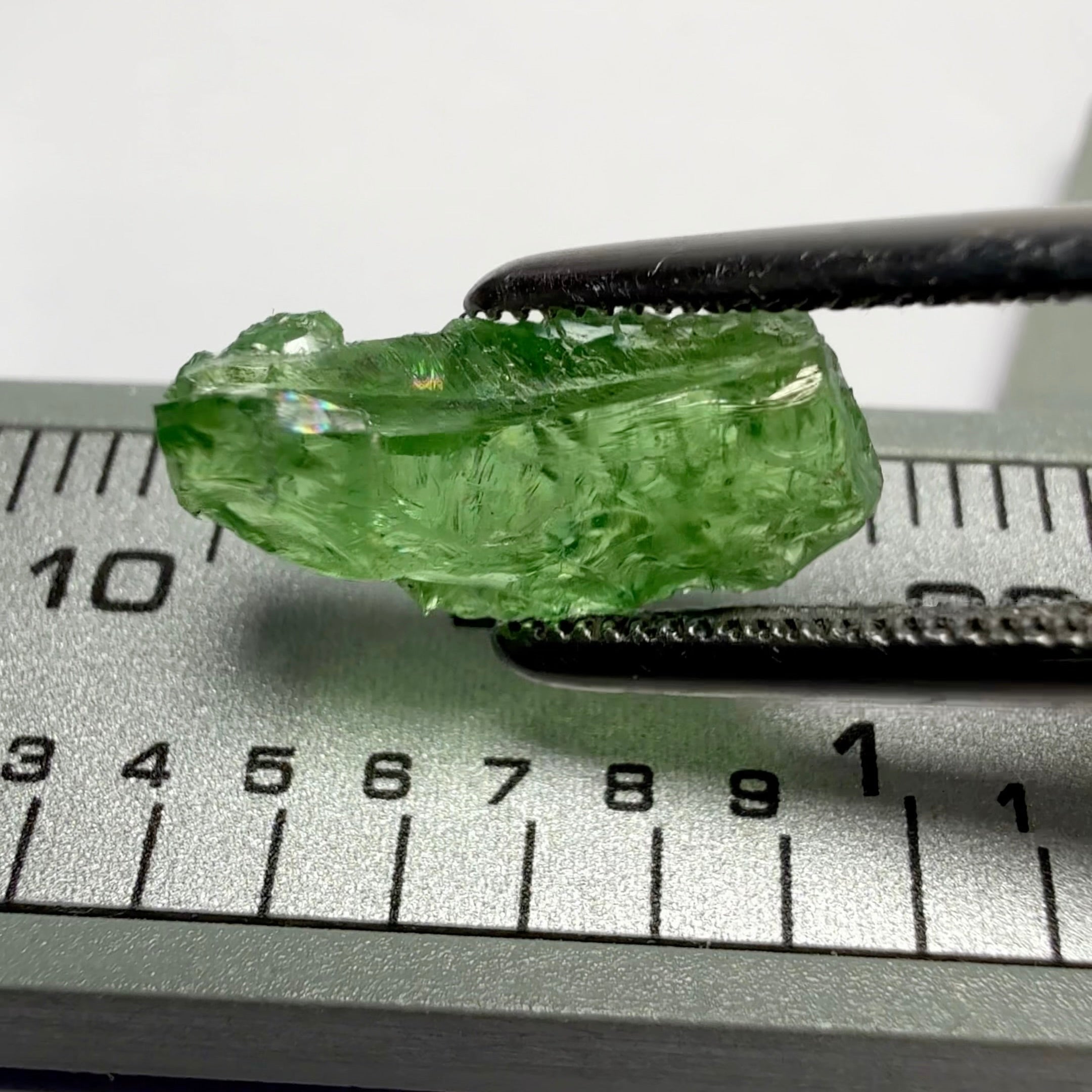 Tsavorite Garnet, Tanzania, 3.16ct, Untreated Unheated, some cracks on the outside skin, inside VS-Si challenging shape, maybe cut a baguette shape