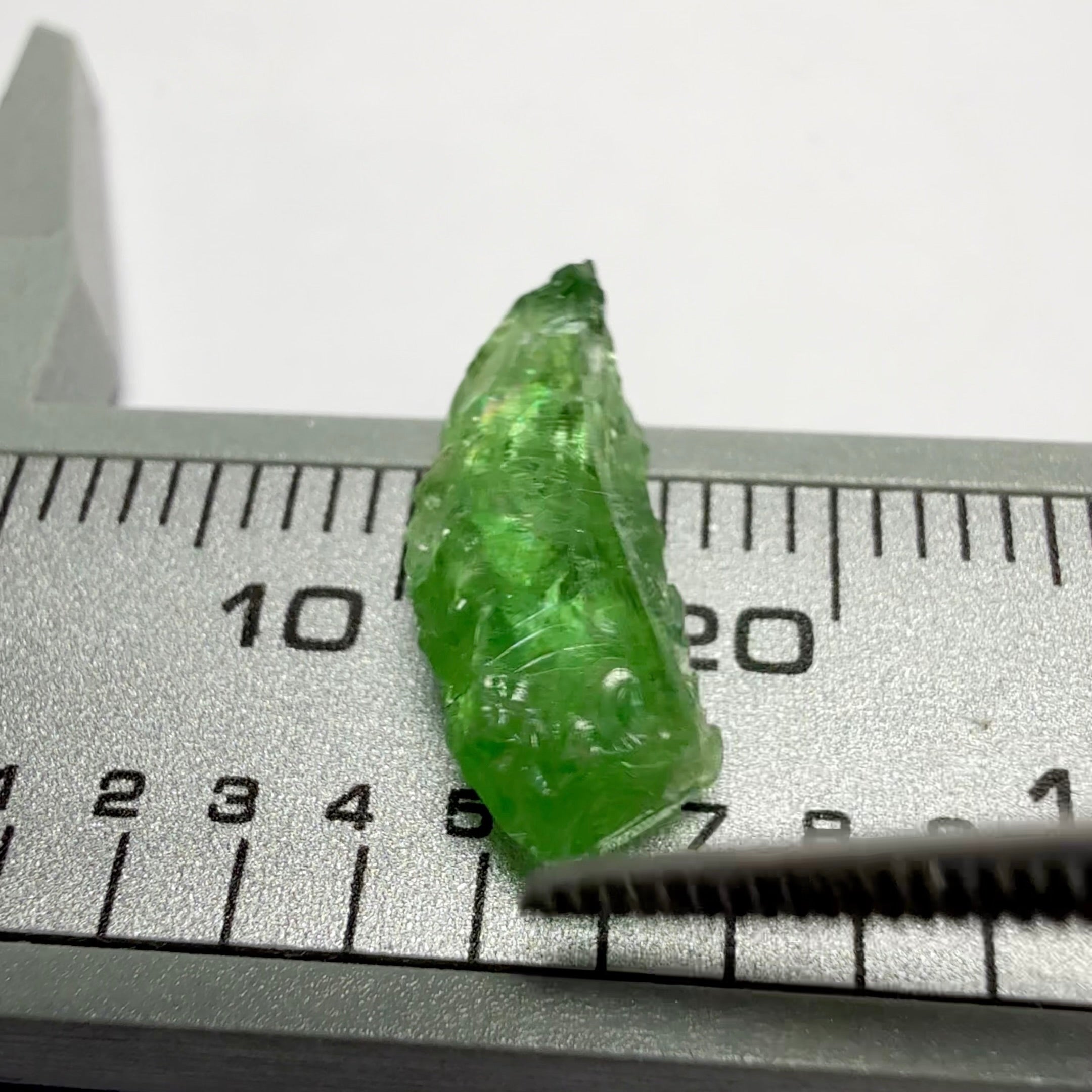 Tsavorite Garnet, Tanzania, 3.16ct, Untreated Unheated, some cracks on the outside skin, inside VS-Si challenging shape, maybe cut a baguette shape